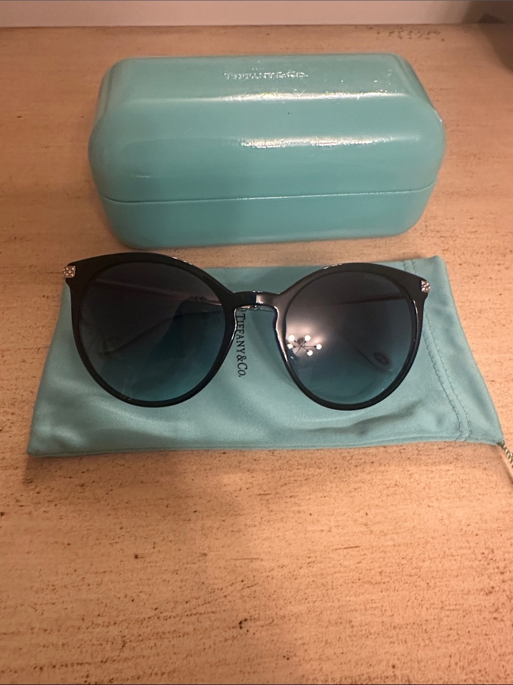 Tiffany & Co. Black Round Sunglasses with Blue Gradient Lenses